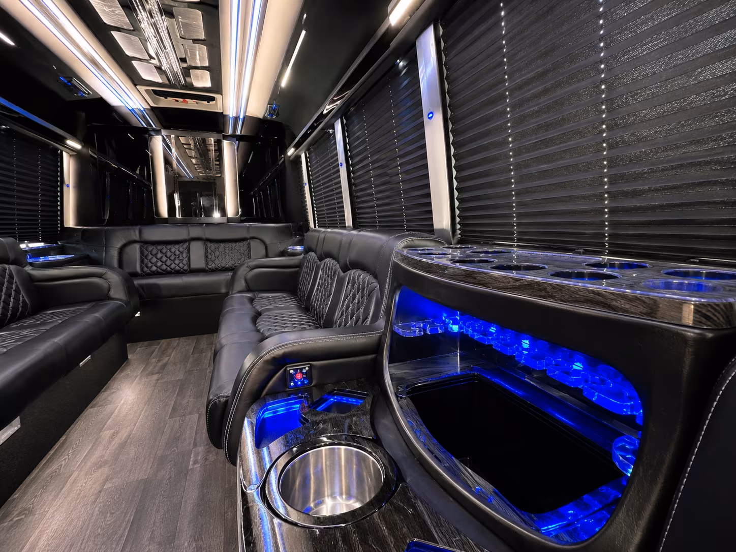 Passenger seating aboard a party bus rental serving Queens